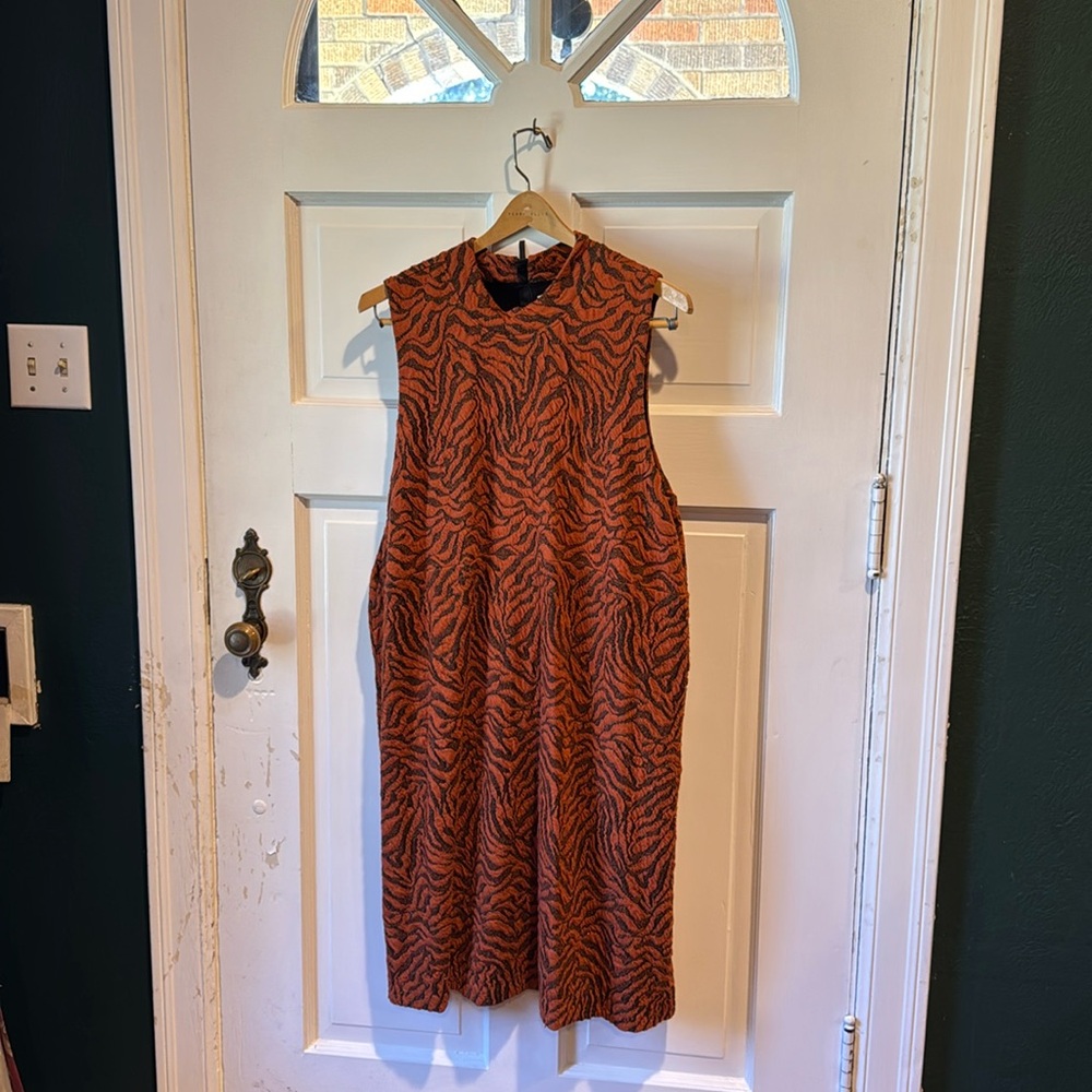 Anthropologie knit dress with lurex thread. Perfect for work or a night out.